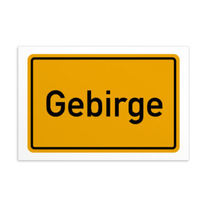 Ein gelb-weißes Schild mit der Aufschrift Gebirge-Postkarte.