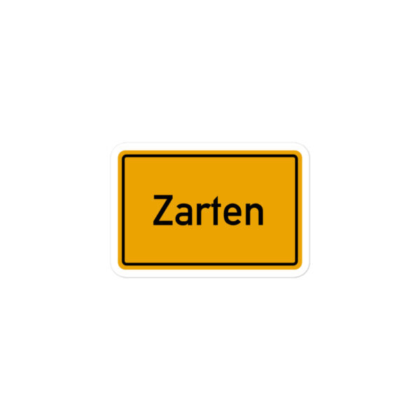 Ein gelbes Schild mit der Aufschrift „Zarten“ und „Blasenfreie Aufkleber“.