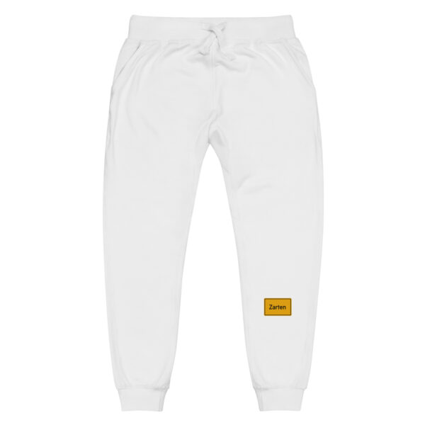 Eine Unisex-Fleece-Jogginghose mit gelbem Aufnäher.