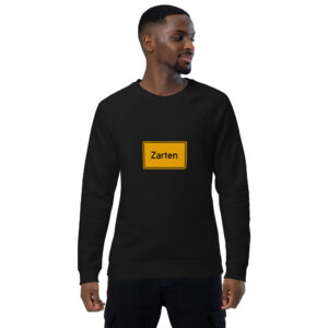 Ein Mann trägt einen schwarzen Unisex-Bio-Raglan-Pullover mit der Aufschrift Züren darauf.